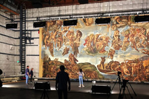 image of a stage with a heavily decorated backdrop