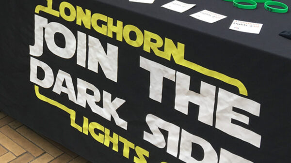 A photo of a Longhorn Lights Out sign.