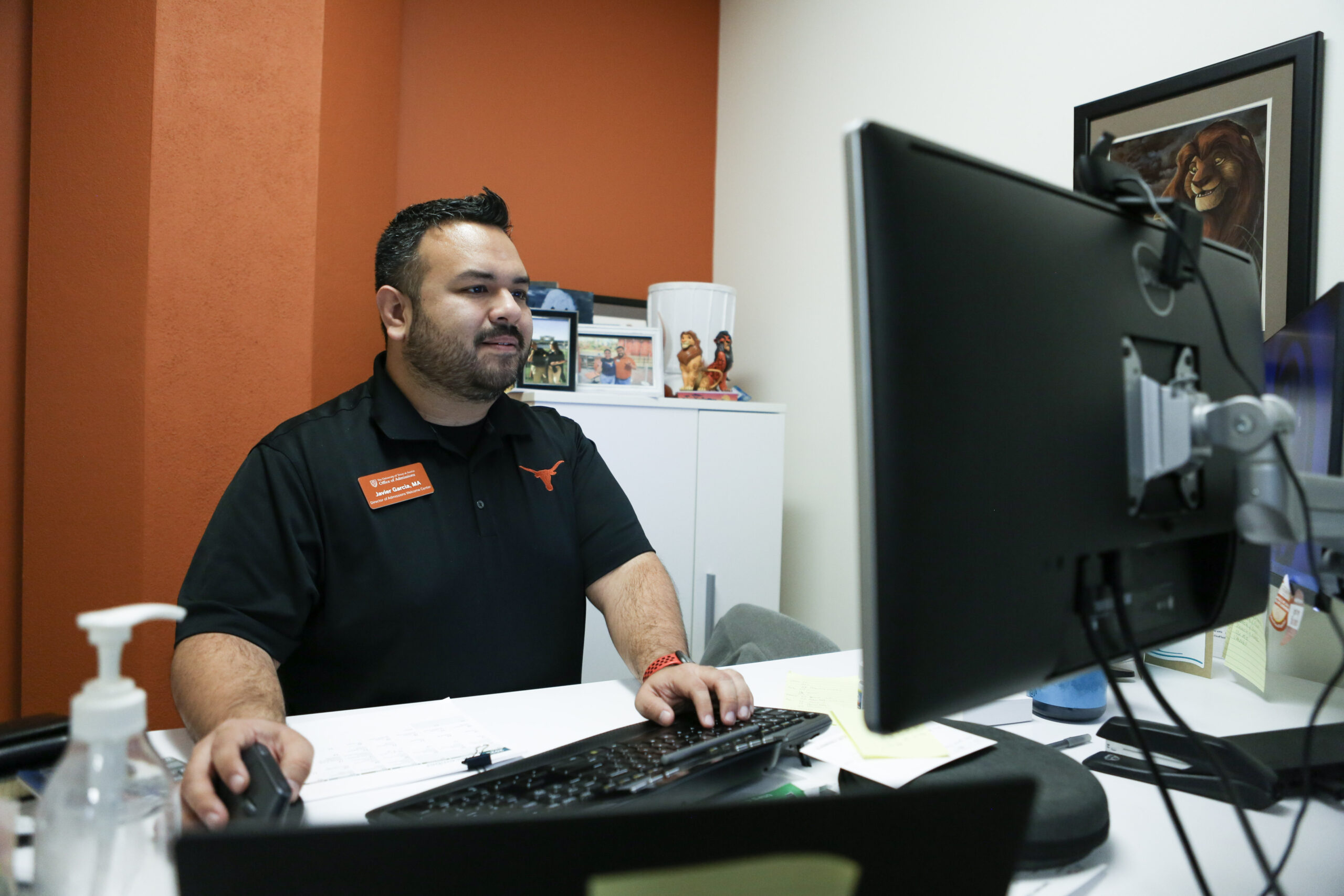 Javier Garcia works at his desk