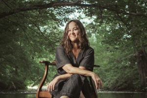 Photograph of lady sitting in water